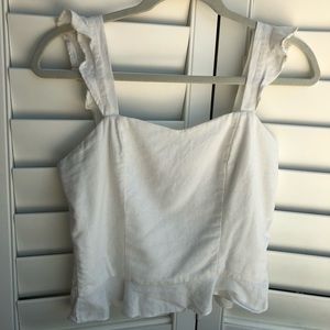 White tank top with ruffle sleeve detailing